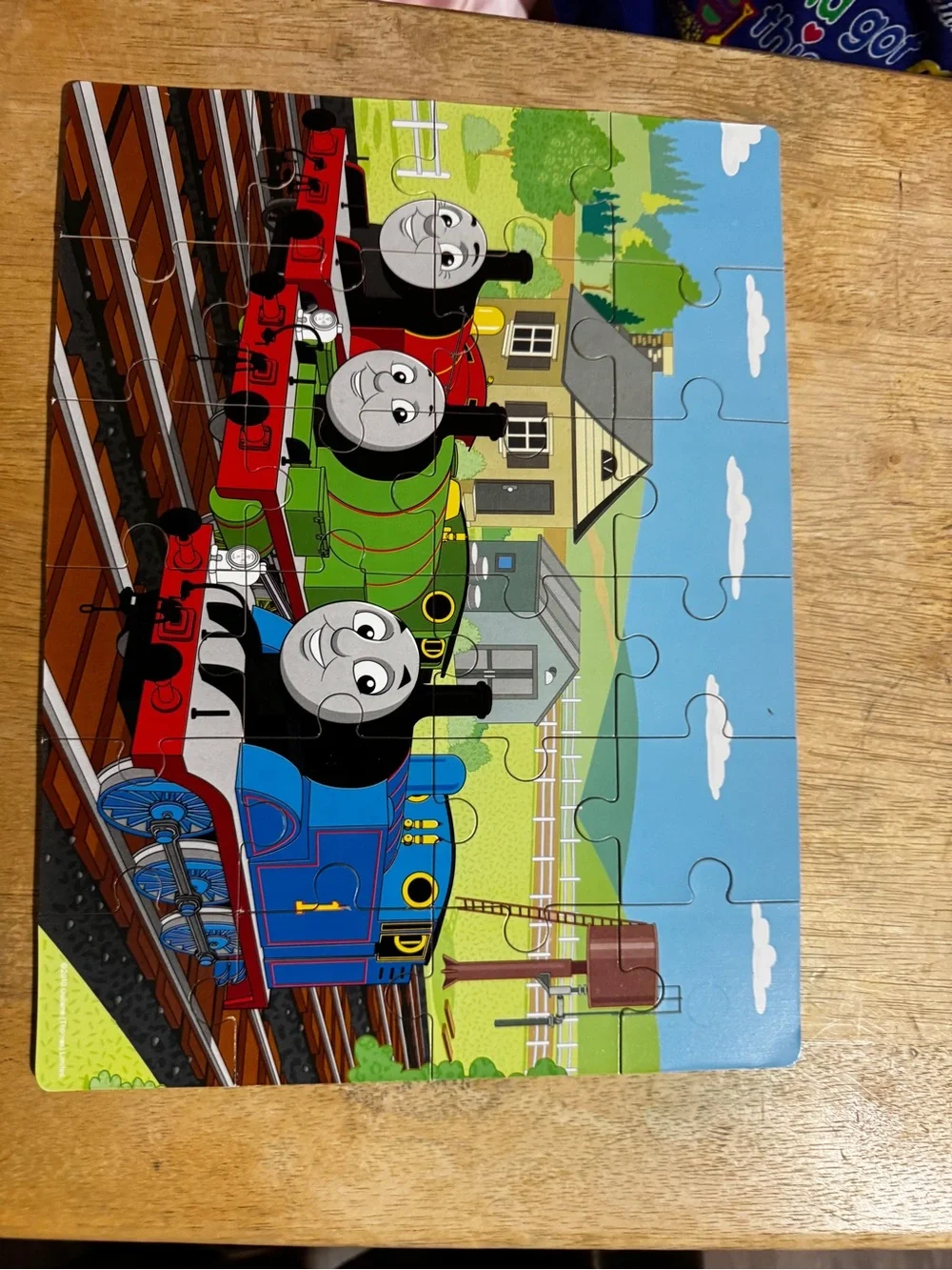 Thomas & Friends Colorful Blue Train Puzzle Pieces in Wood Organizer